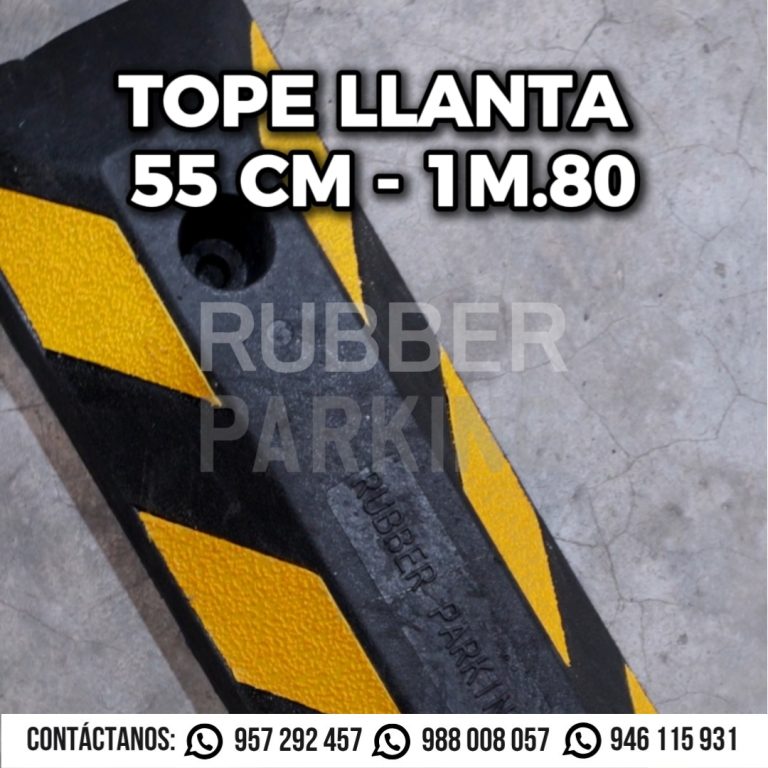 Tope de llanta de caucho negro con franjas amarillas en primer plano