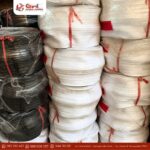 Rollos de waterstop de PVC blanco y negro apilados en el almacén de Global Rubber